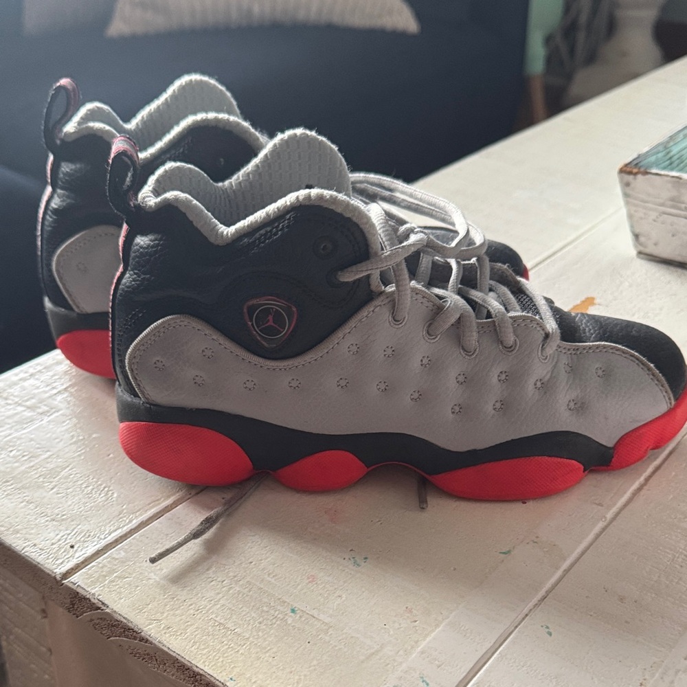 Jordan Kids Black and Gray Sneakers with Red Accents